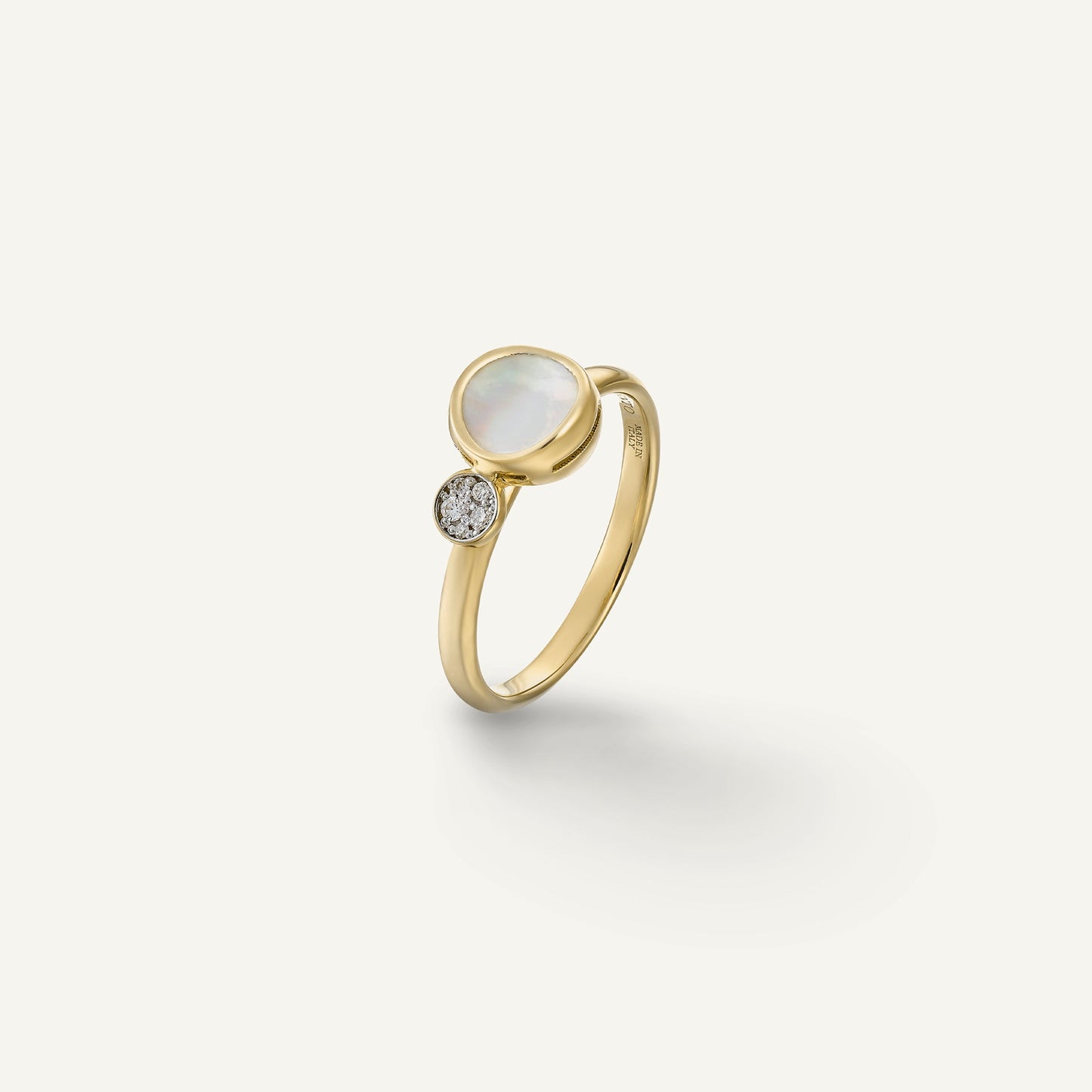 Gold ring with mother of pearl and diamonds