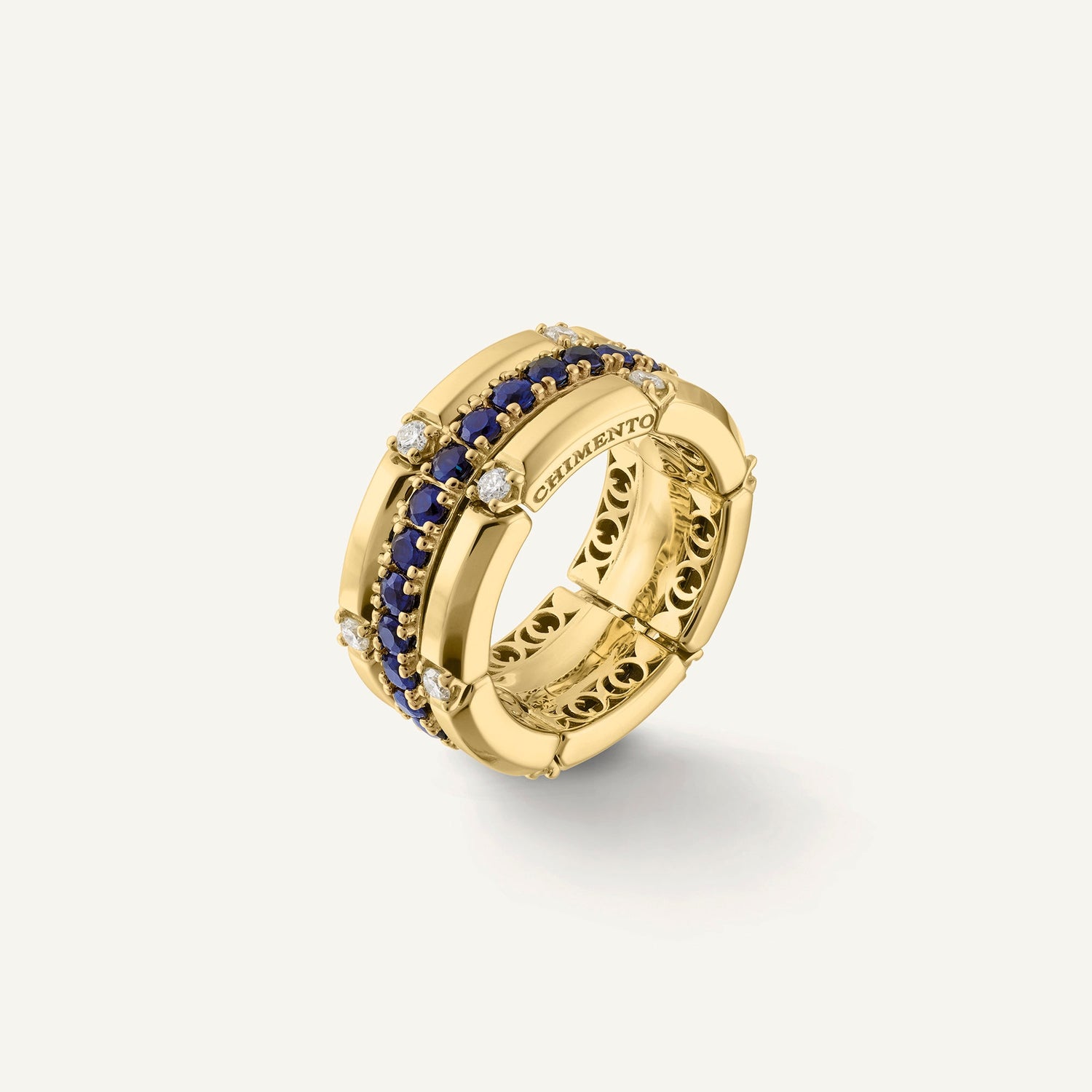 Anello in oro con diamanti e gemme colorate