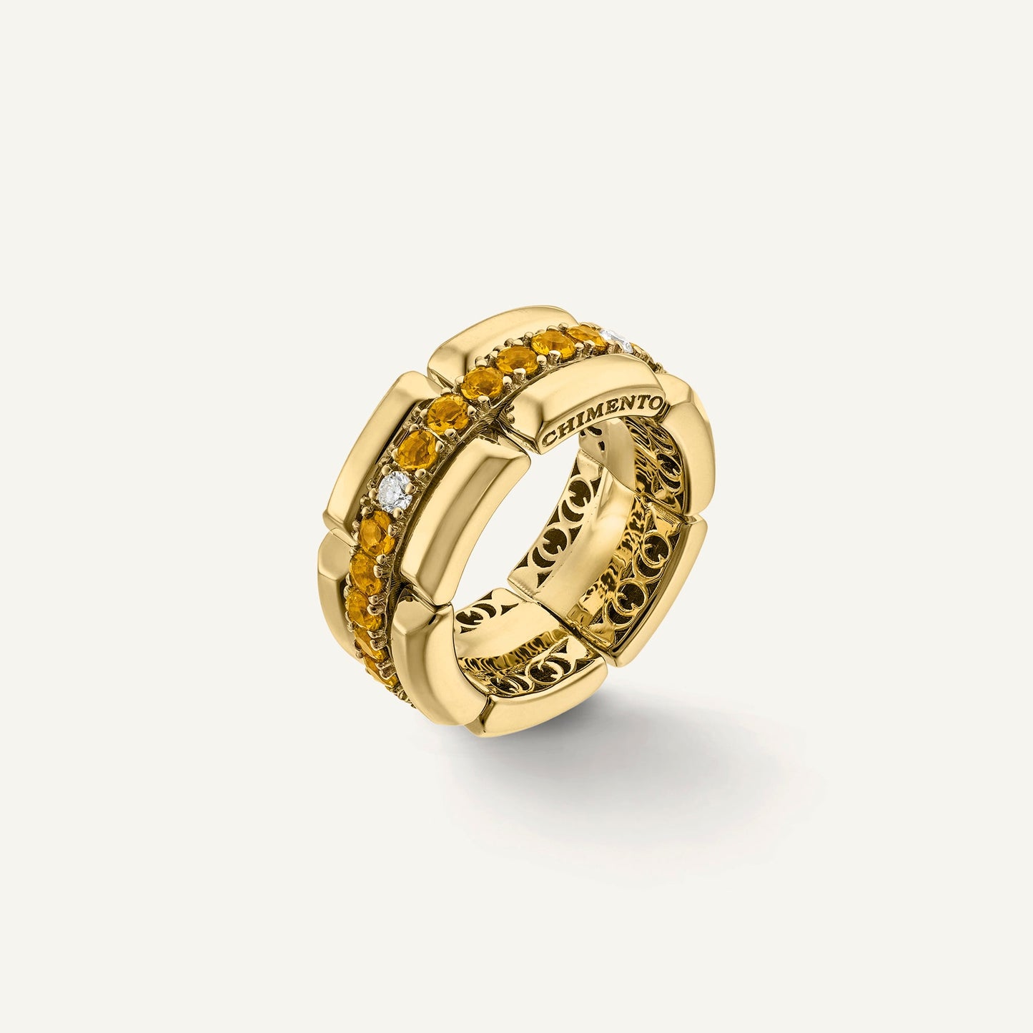 Anello in oro con diamanti e gemme colorate