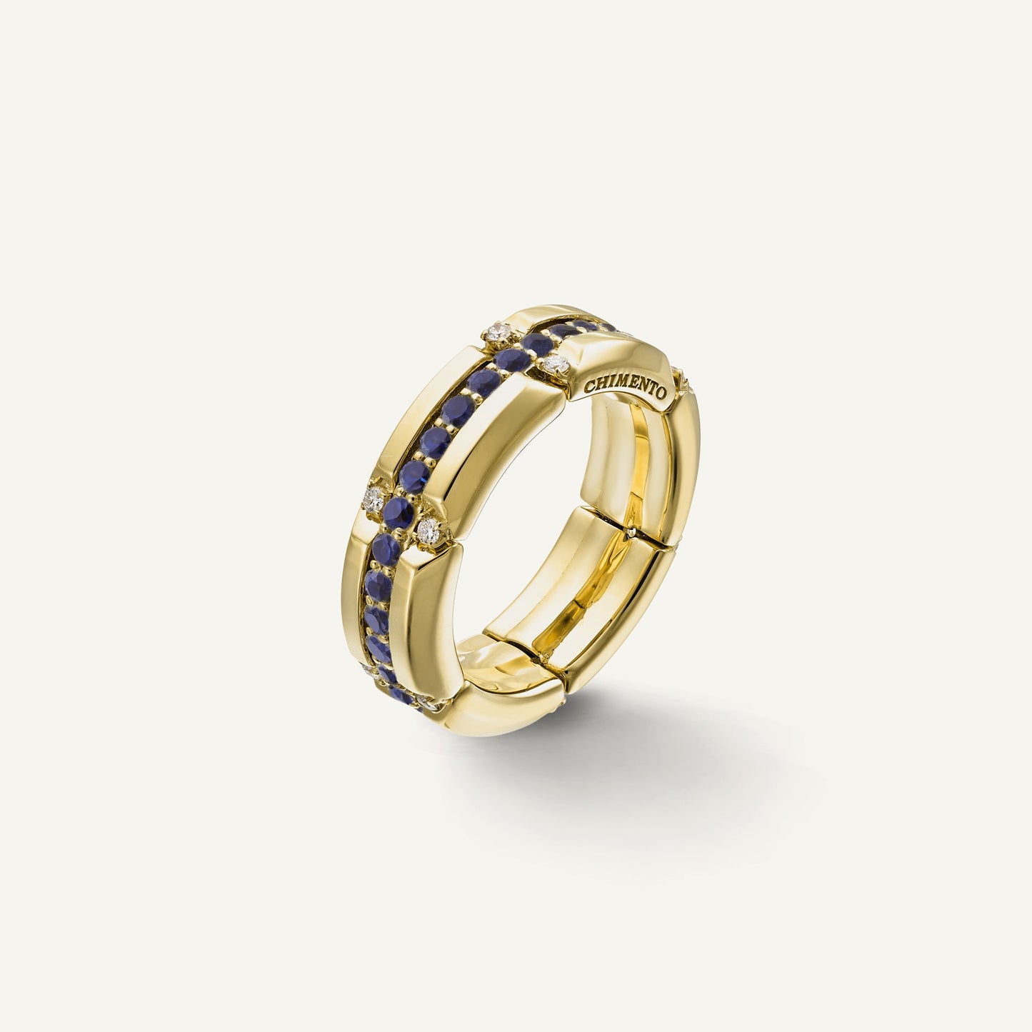 Anello in oro con diamanti e gemme colorate